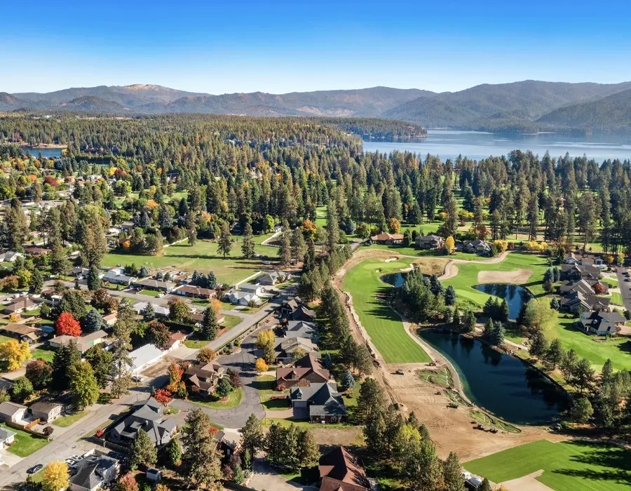 Hayden Lake surrounded by pine forest and homes